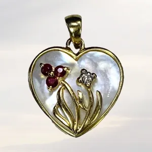 1960s Heart Shaped Mother of Pearl Pendant with Diamond and Ruby Flowers set in 10k Yellow Gold.