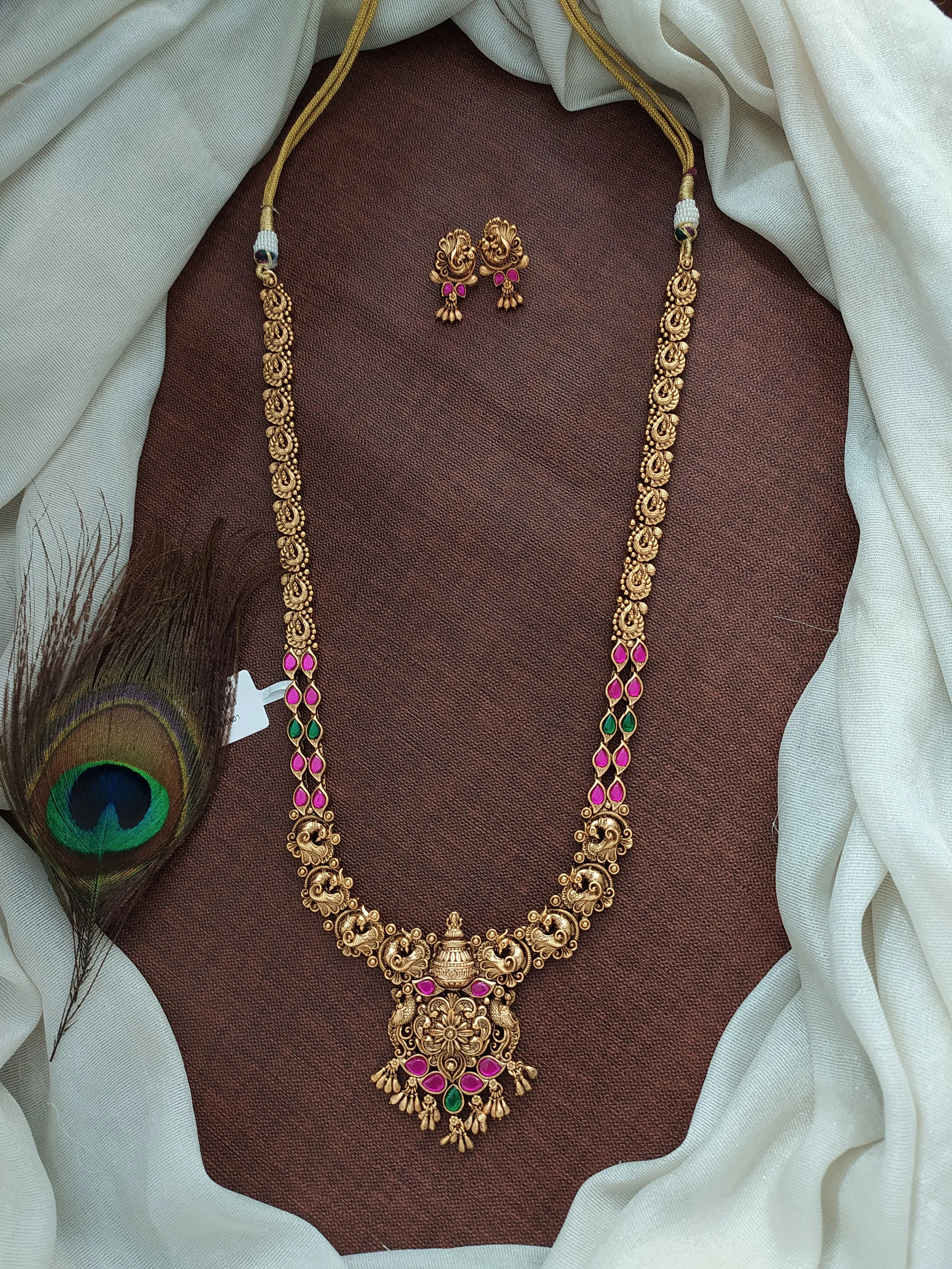 Antique Copperish Finish Long Haram Set with Nakshi & Jadau Kundan Work in Peacock Design