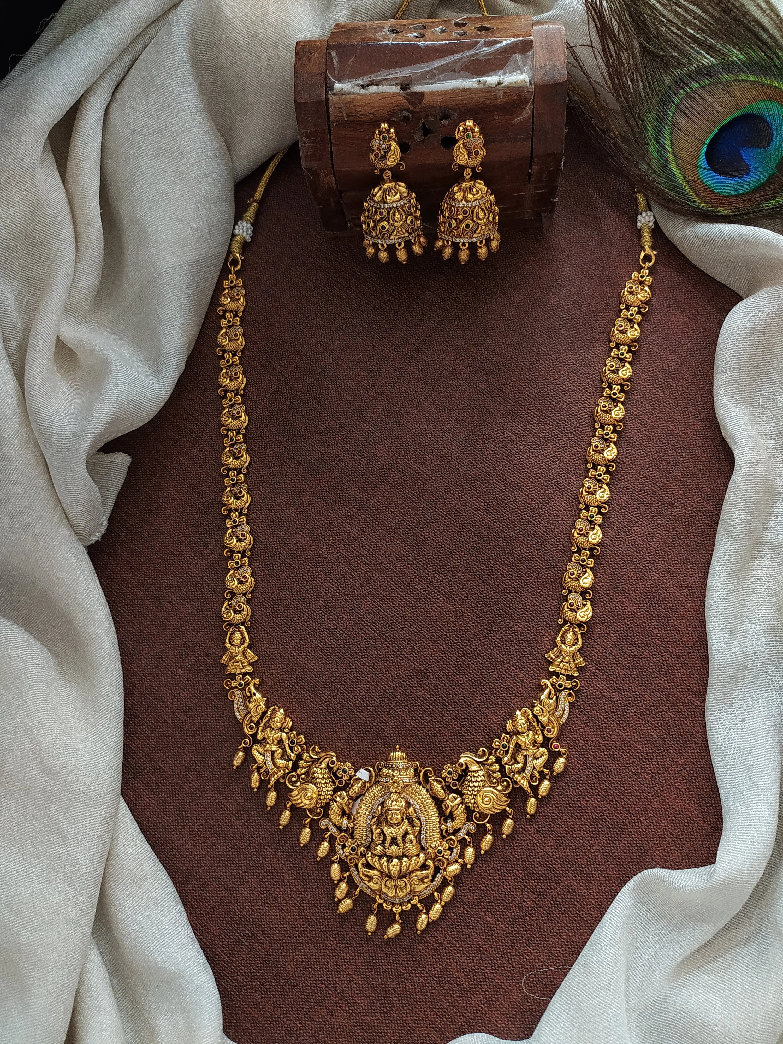 Antique Lakshmi Long Haram Set with Nagas Work and Zircon Stones