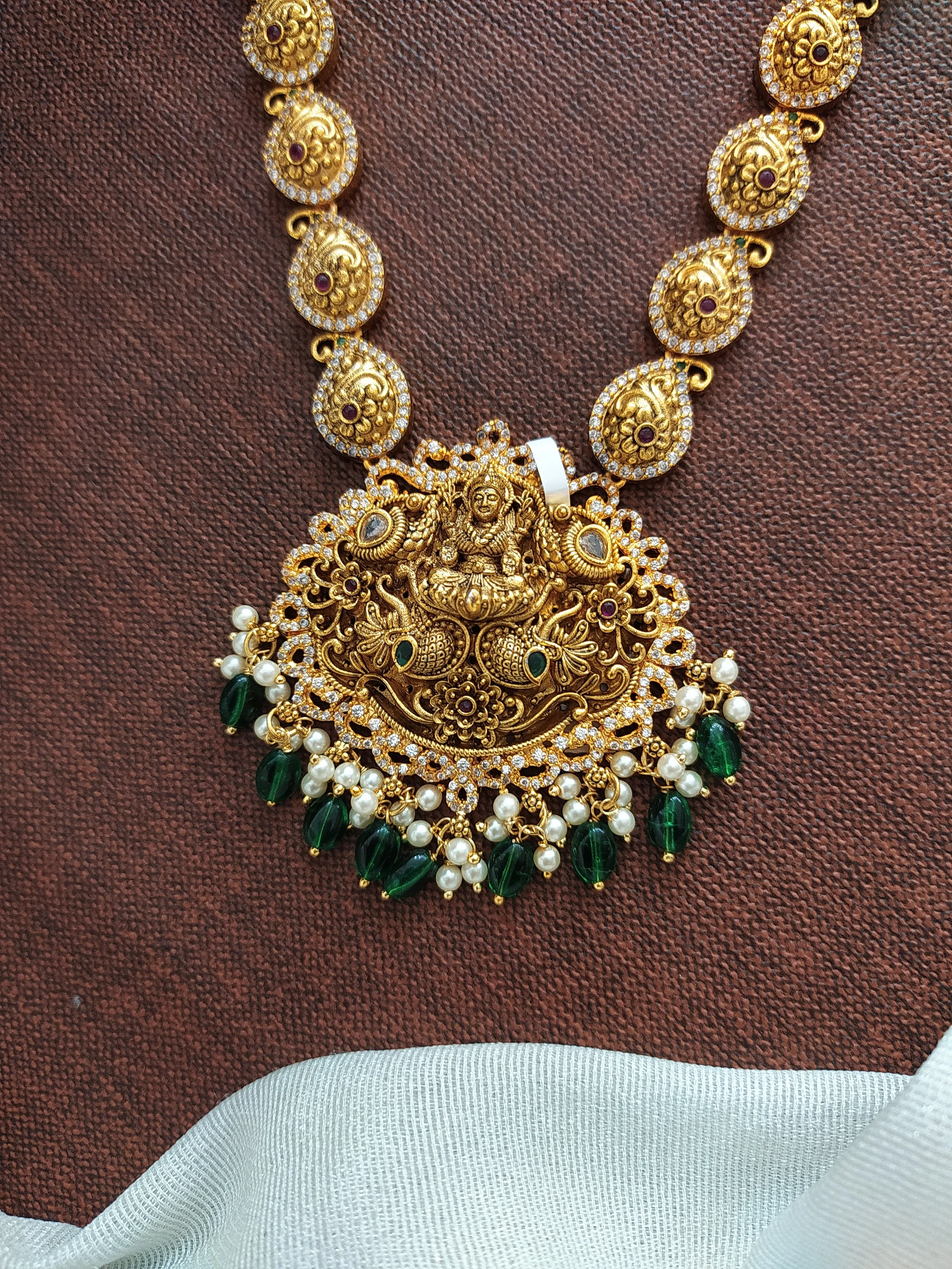 Antique Lakshmi Long Haram Set with Zircon Stones, Green Beads, and Pearls