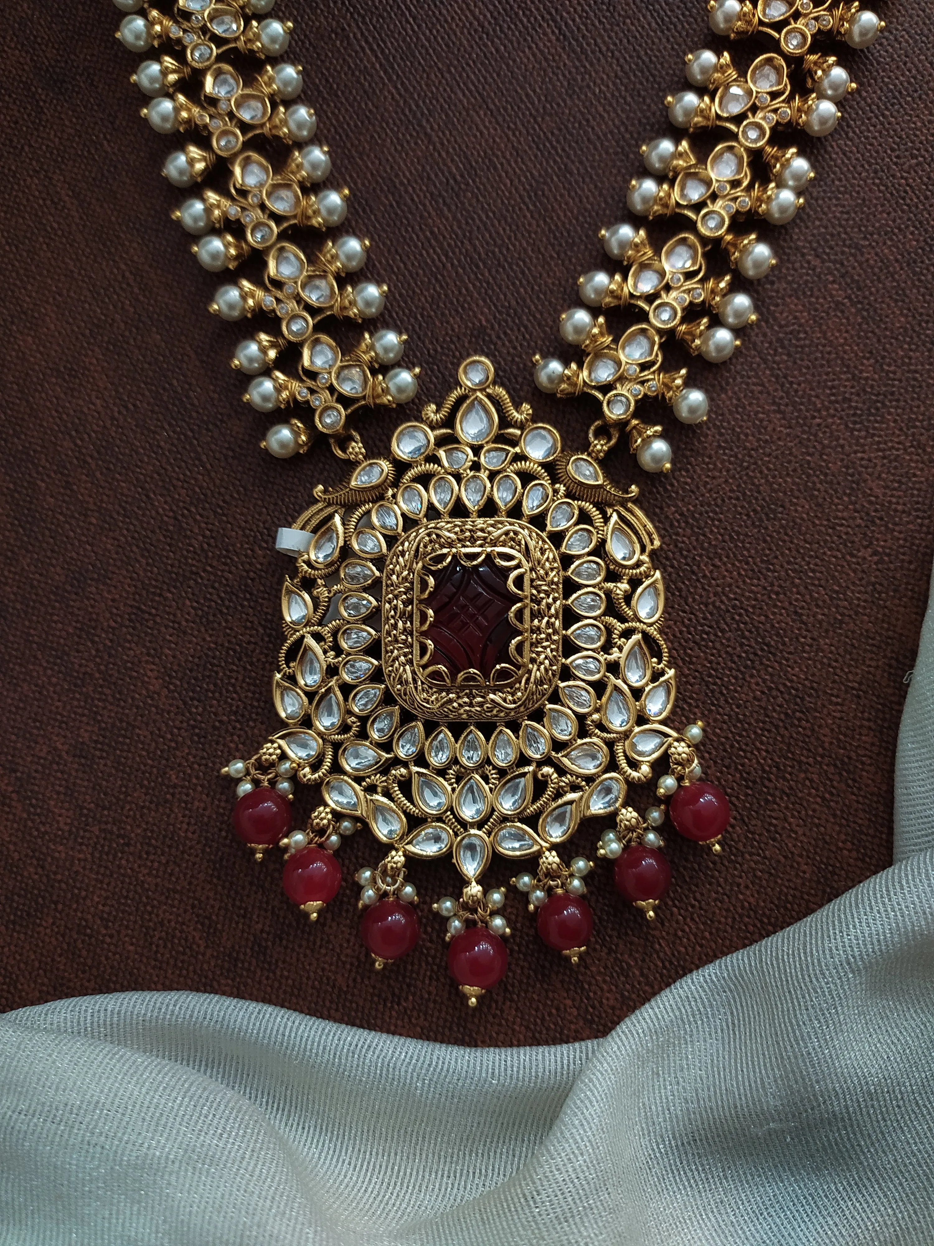 Antique Long Haram Set with Ruby Quartz, Kundan Stones, and Pearl Drops