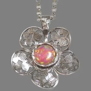 Elegance Defined: Sterling Silver Necklace Set with a silver flower set with a Red Lab-Created Opal