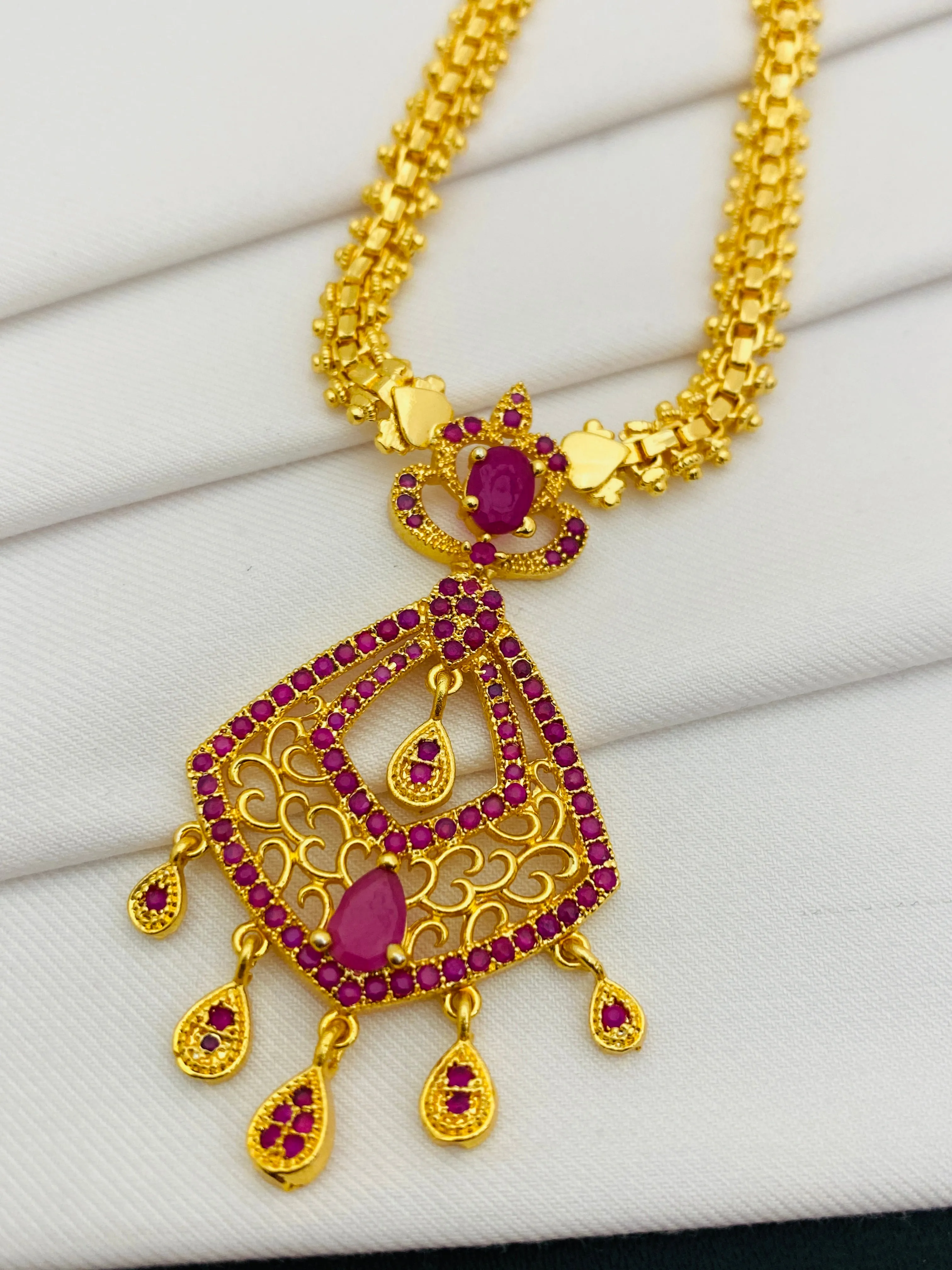 Gorgeous Traditional Party Wear Ruby Stoned Gold Plated Necklace