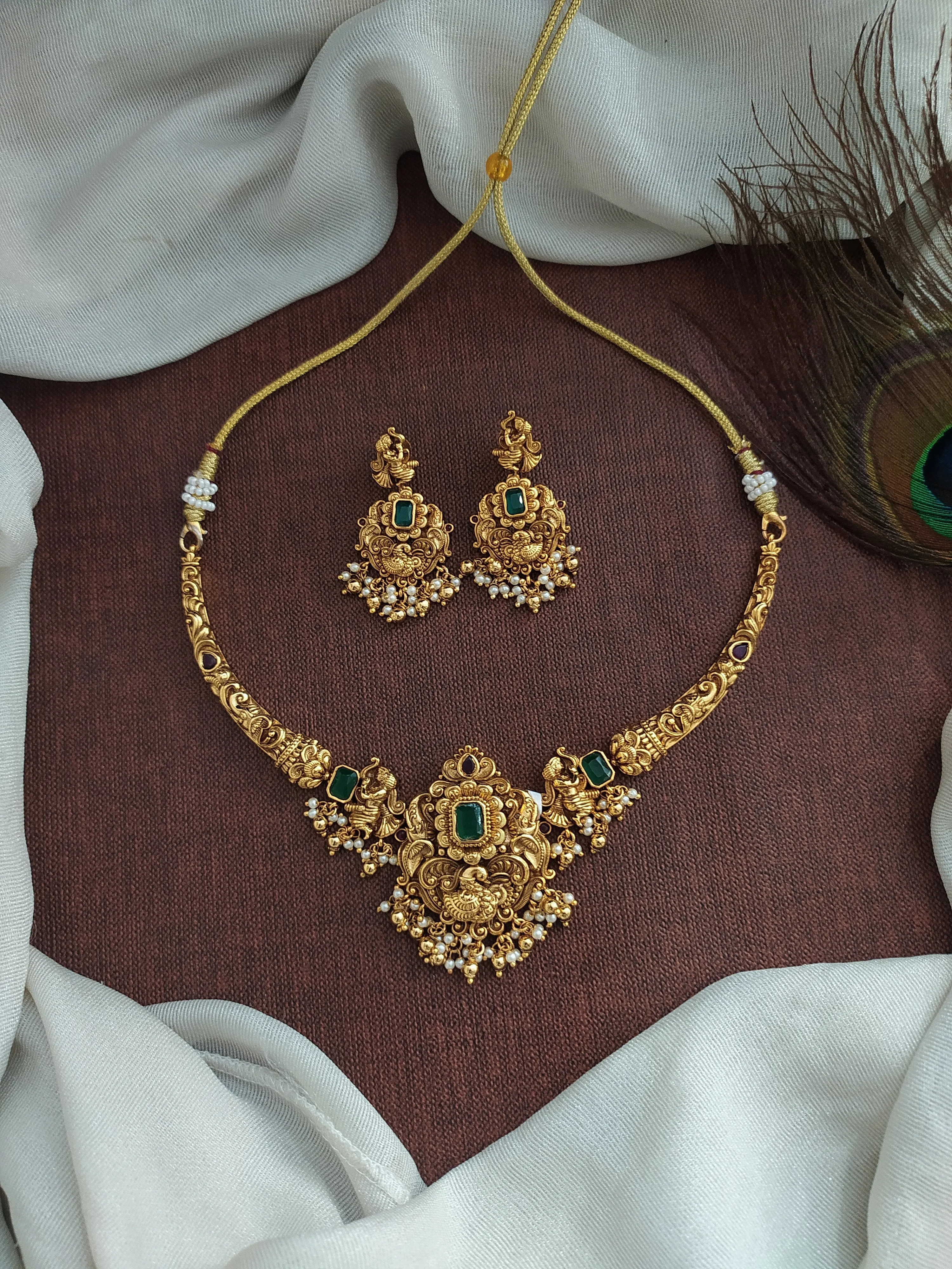 "Antique Kanti (Hasli) Necklace Set with Emerald Stones and Nagas Work"