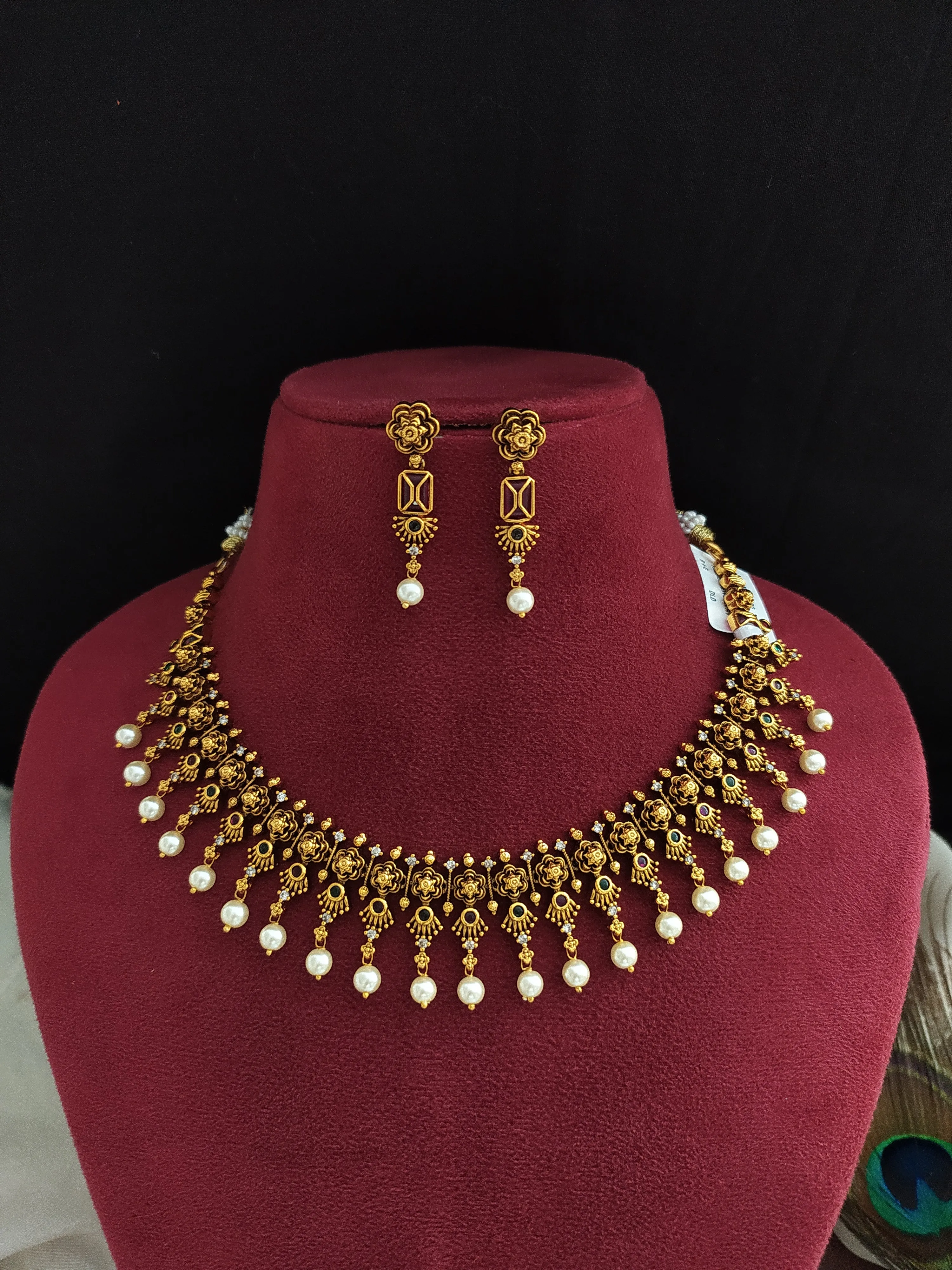 "Traditional Antique Necklace with Earrings featuring Pearl Drops and Kemp & Green Stones"